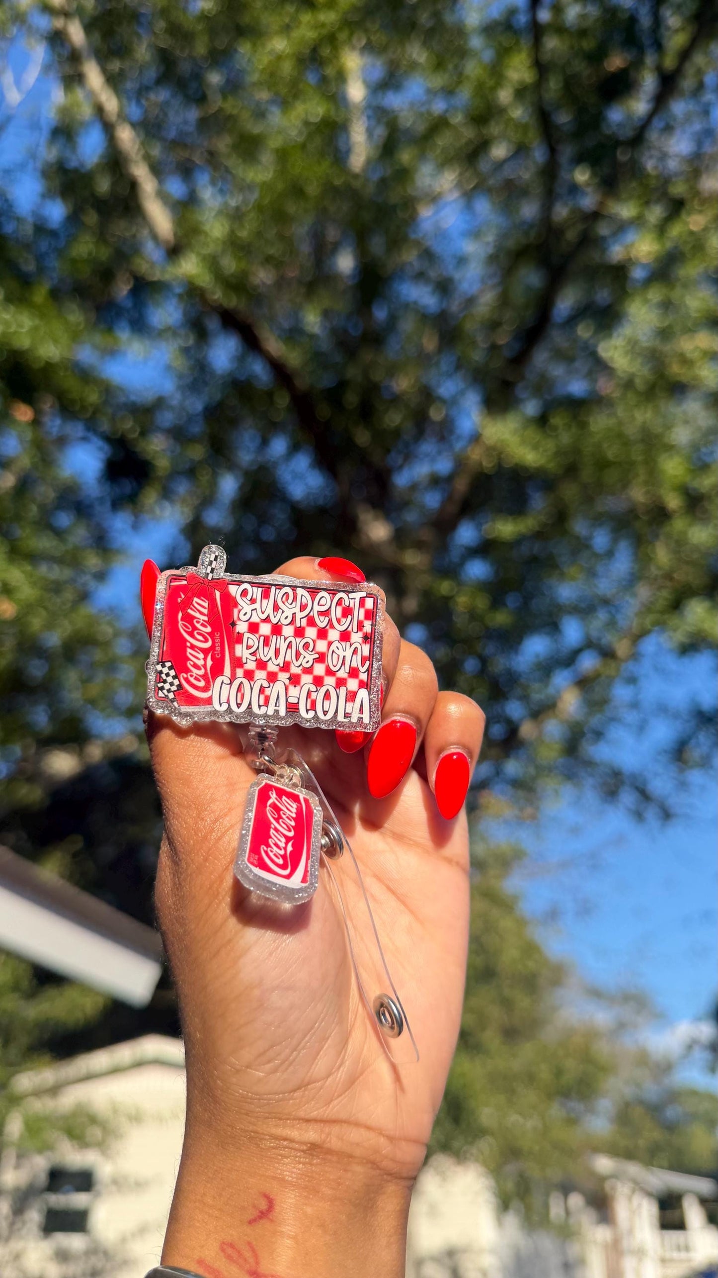 Suspect Loves Coca Cola Badge Reel