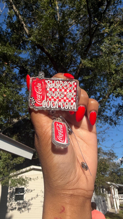 Suspect Loves Coca Cola Badge Reel