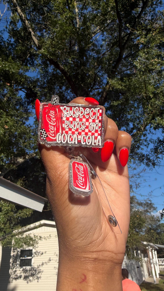 Suspect Loves Coca Cola Badge Reel